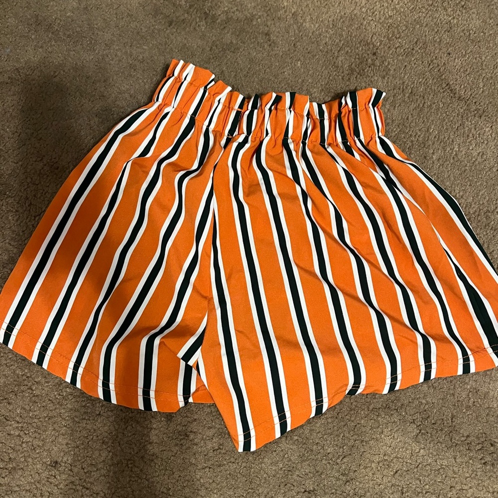 Orange and dark green shorts
